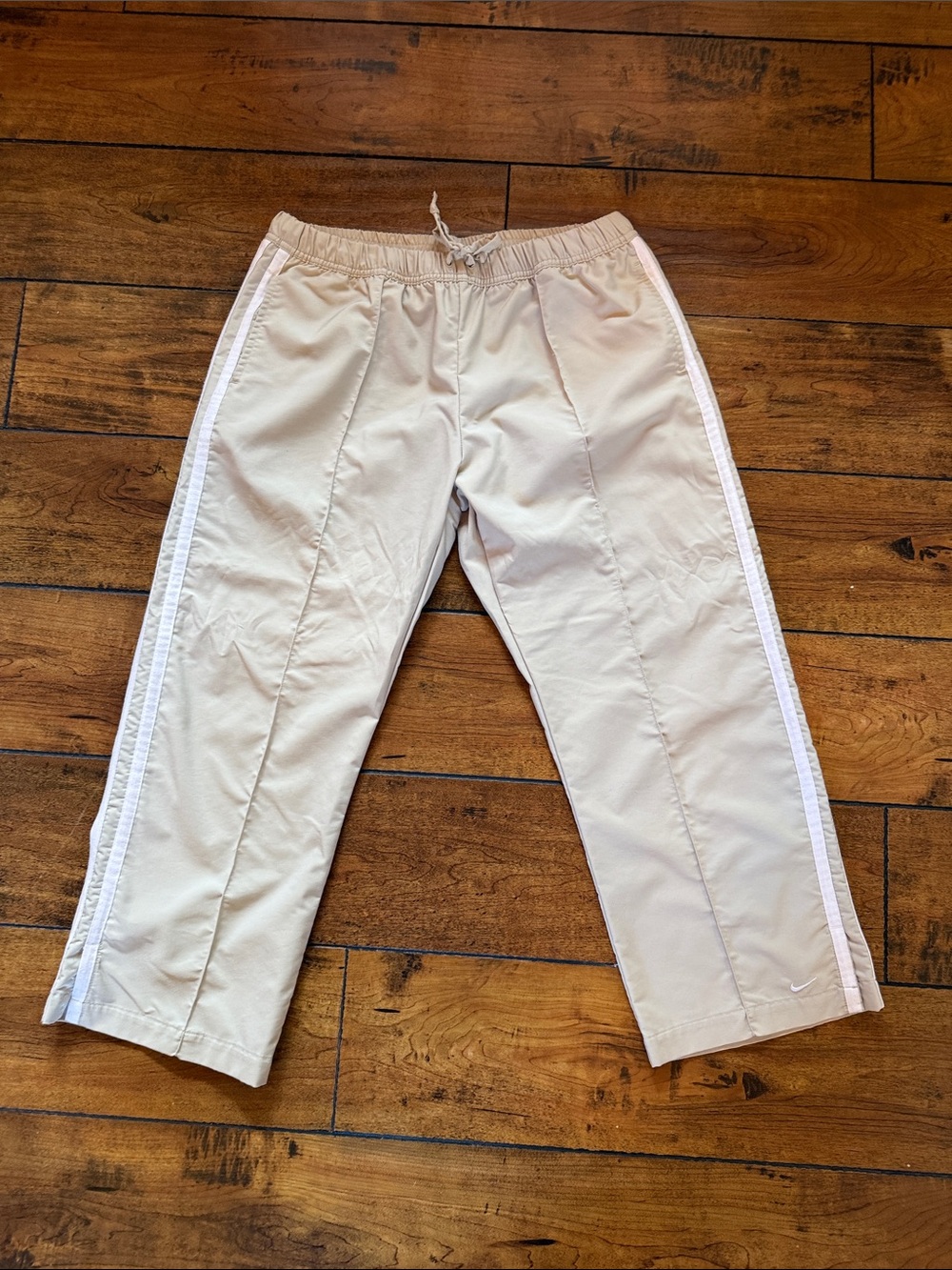 Nike womens Cream golf Pants with White Side Stripes
